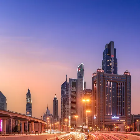 Fairmont Dubai Hotel Exterior photo The hotel (right)